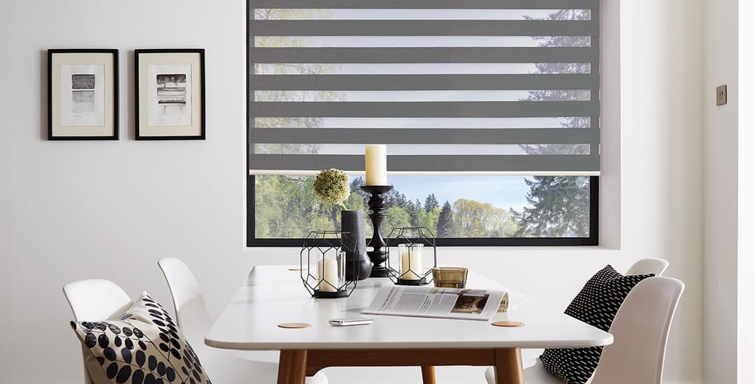 Black day and night blinds in dining room