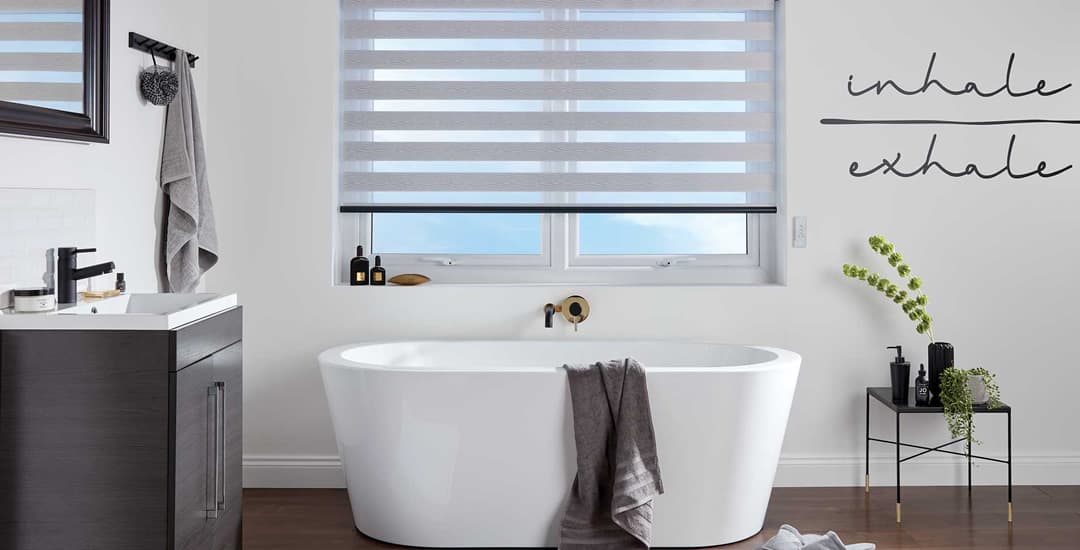 Grey day and night blinds in bathroom