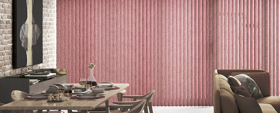 Red vertical blinds in tall window