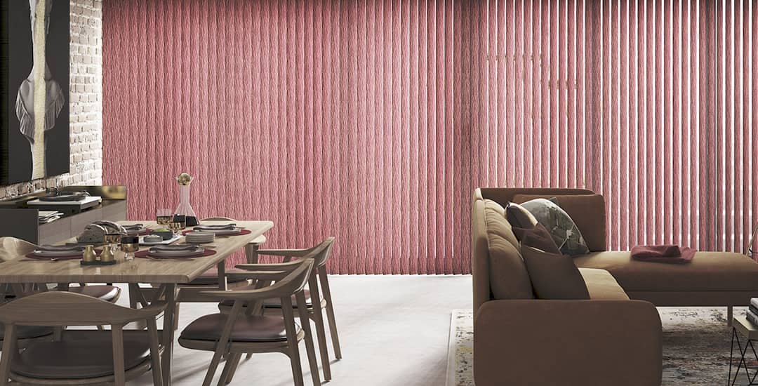 Tall red vertical blinds in long window