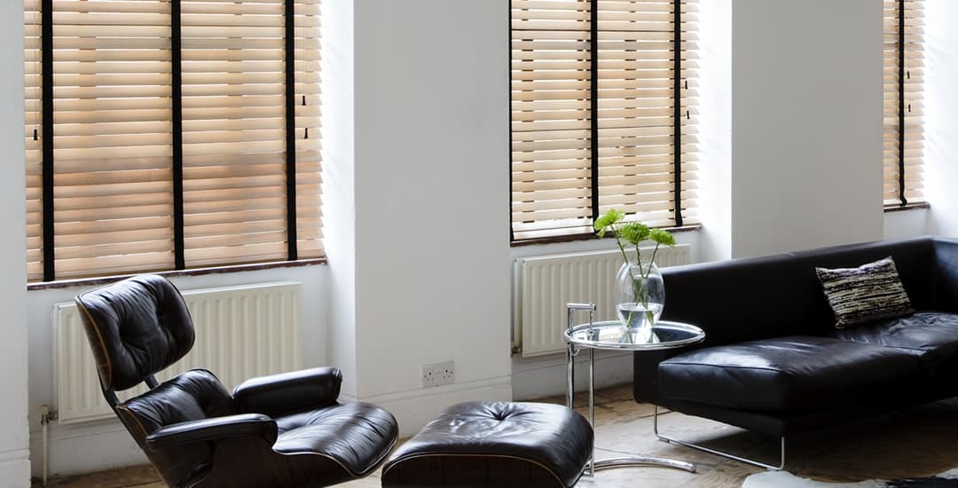Wooden blinds with dark tapes