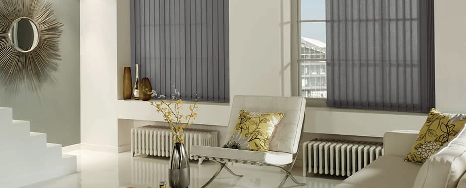 Grey vertical blinds in retro living room