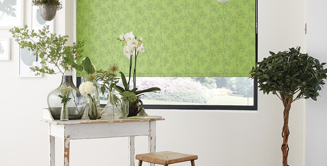 Lime green floral patterned roller blinds