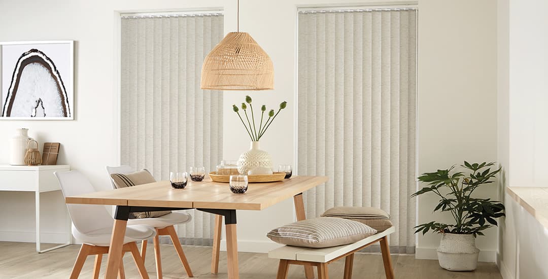 Luxury beige textured vertical blinds in dining room