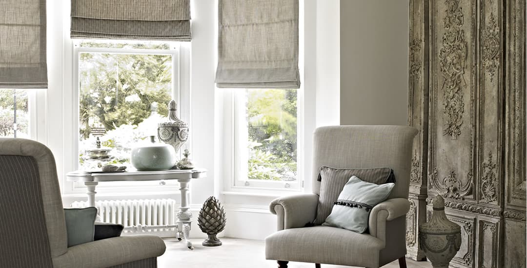 Luxury brown roman blinds in sitting room