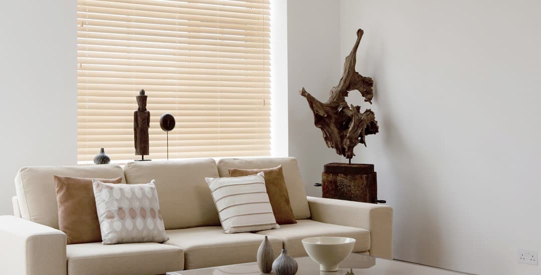 Maple light wooden blinds in living room