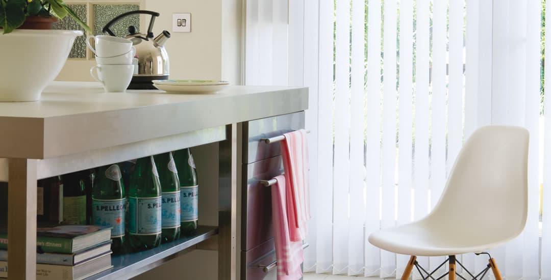 White vertical blinds in kitchen