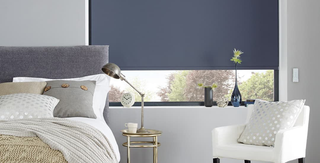 Blue blackout blinds in bedroom