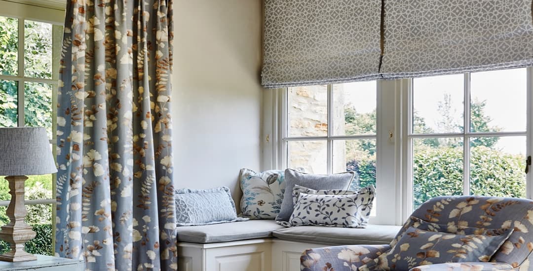 Silver grey patterned roman blinds living room