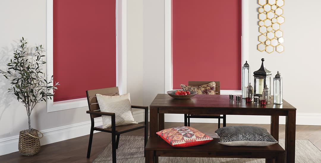 Red blackout blinds in dining room