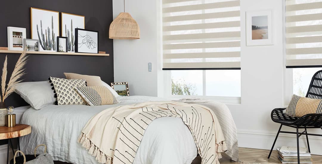 Beige day and night blinds in bedroom