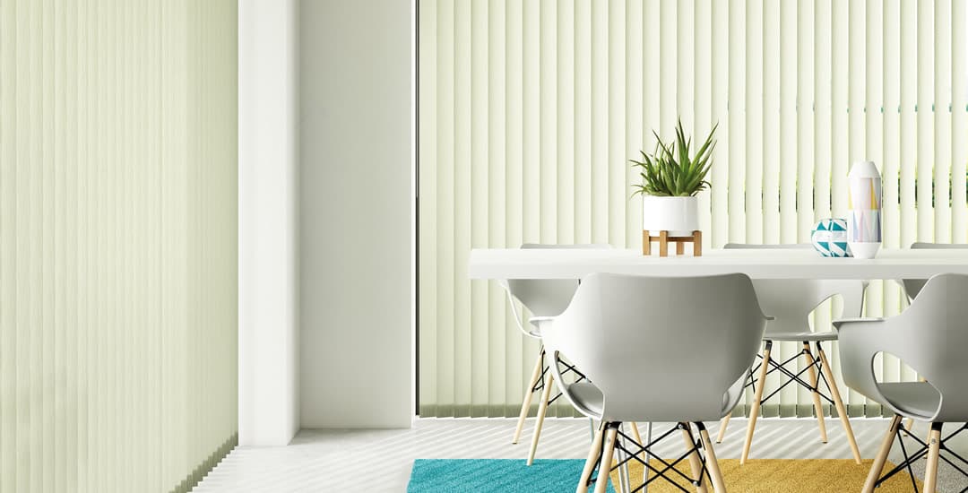 Green vertical blinds at dining room patio doors