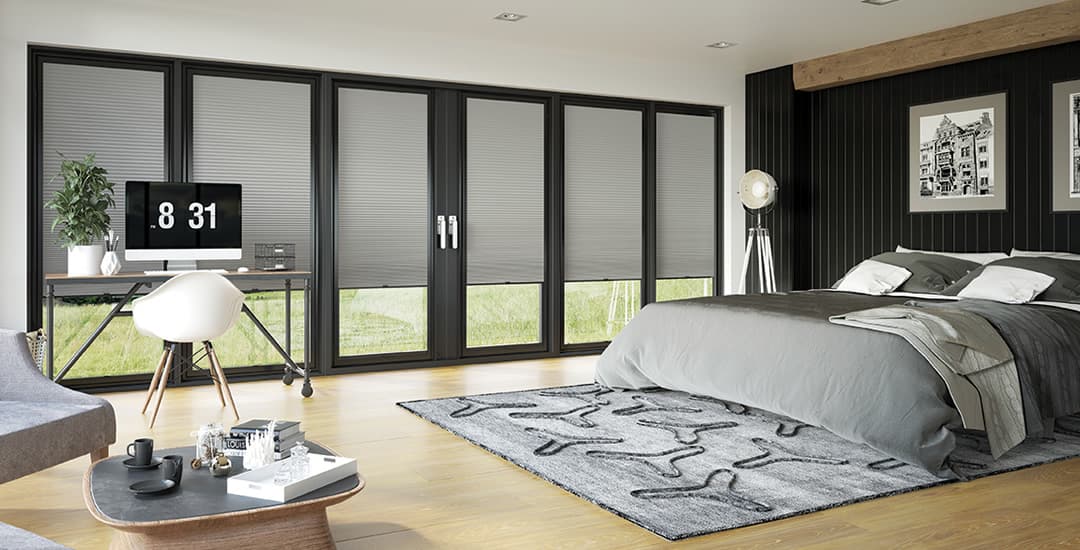 Grey perfect fit pleated blinds on bifold doors