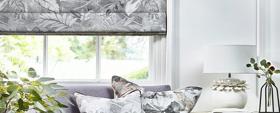 Grey floral roman blind in lounge