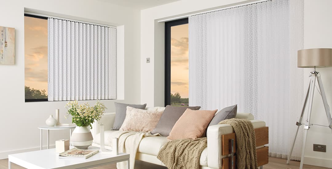 White vertical blinds at living room patio doors