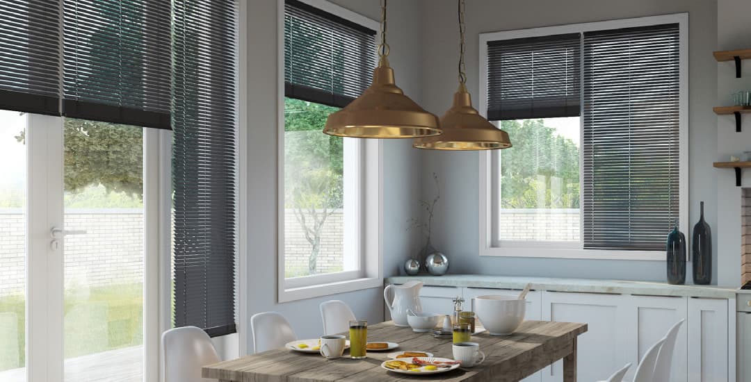 Black aluminium venetian blinds in kitchen