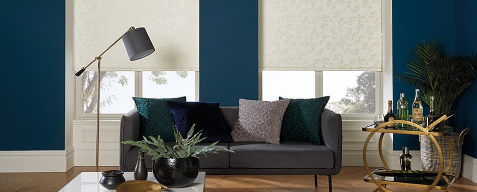 Cream floral blackout roller blinds in blue lounge
