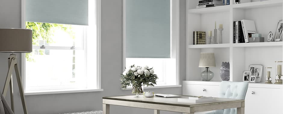Duck egg blackout roller blinds in grey and white room