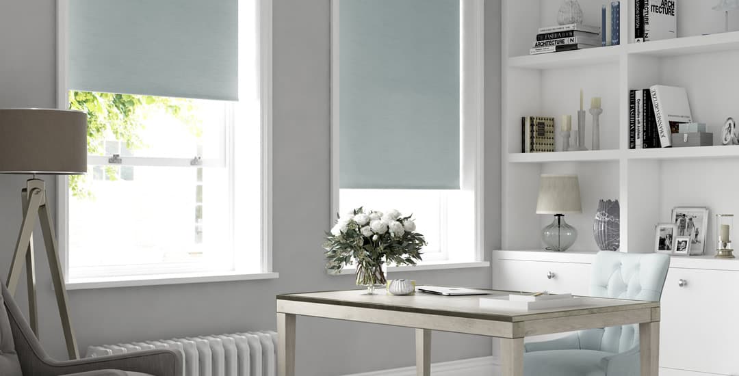 Duck egg blackout roller blinds in grey and white room