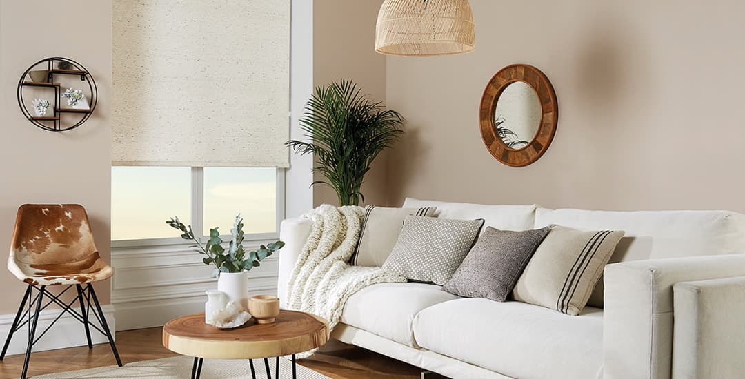 Cream texture roller blinds in living room