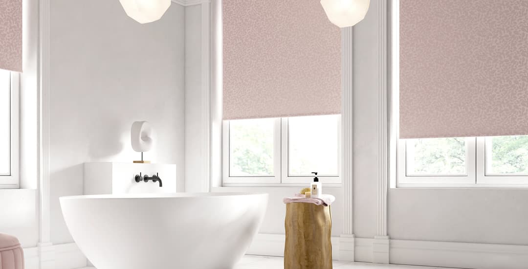 Pink floral patterned waterproof PVC roller blinds in bathroom