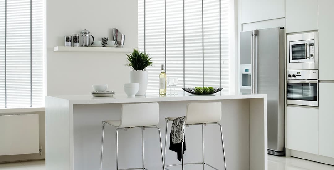 White wooden blinds with grey tapes in contemporary kitchen