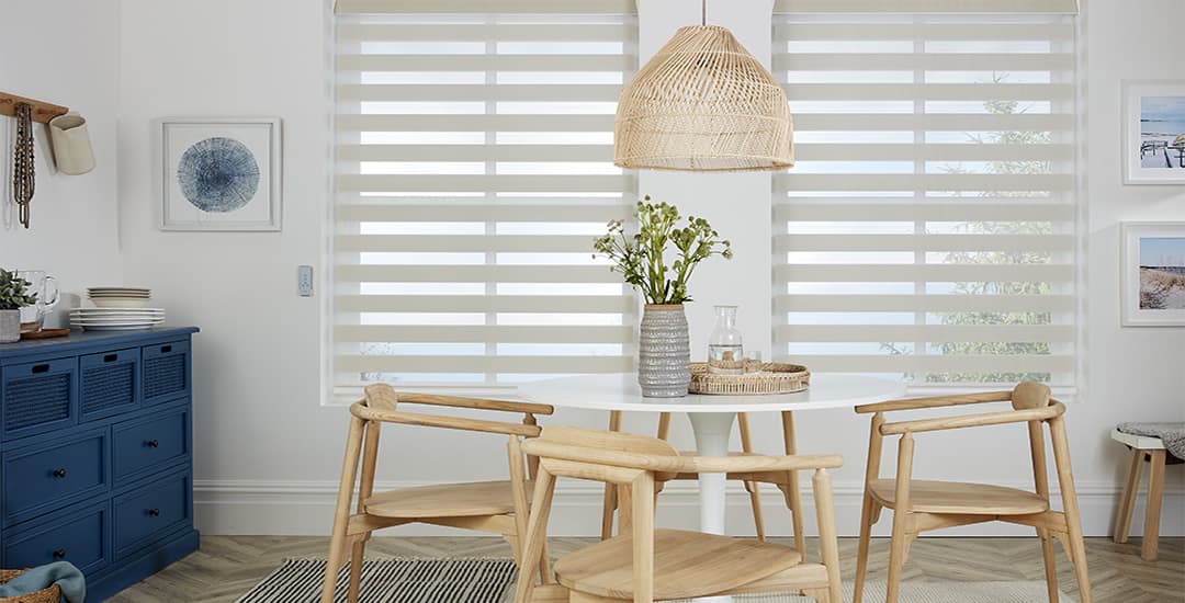 Beige day and night blinds in kitchen diner 