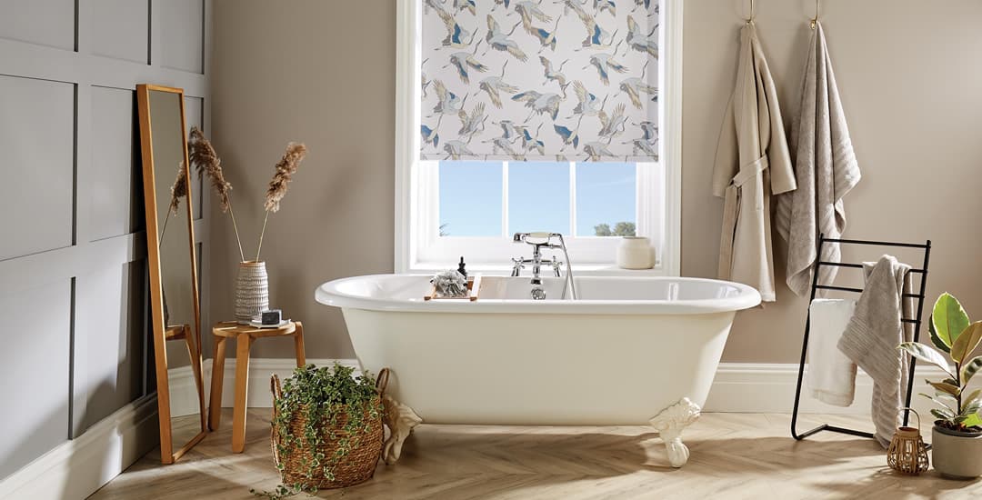 Herons patterned polyester roller blinds in bathroom