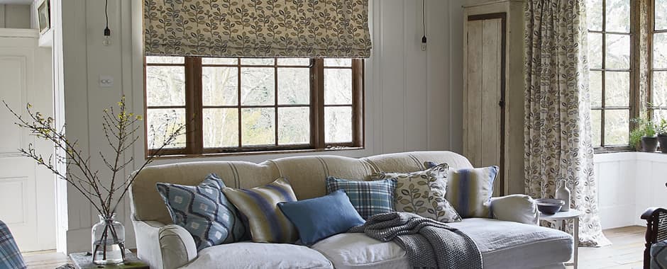 Luxury floral roman blinds in traditional living room
