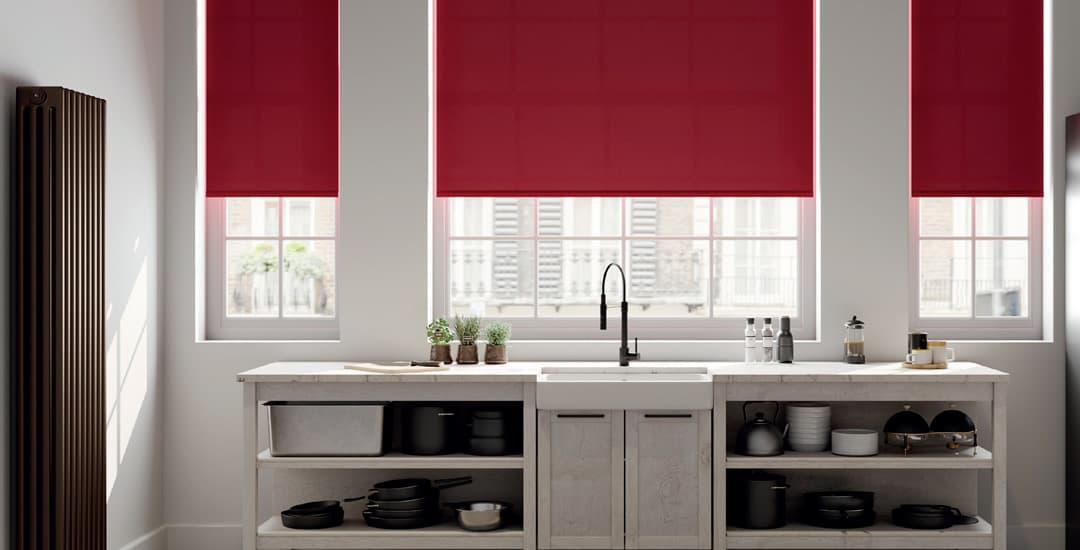 Red blackout roller blinds in contemporary kitchen