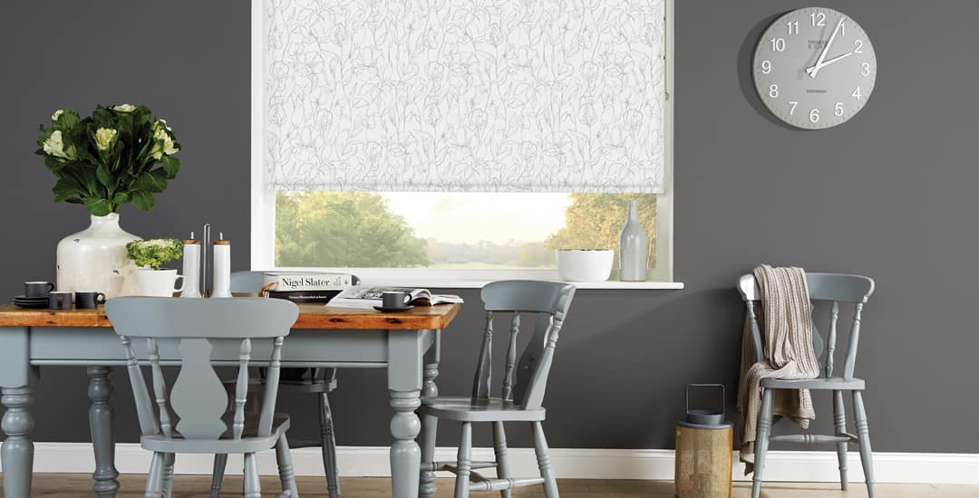 Sweet pea floral patterned roller blinds inside window recess