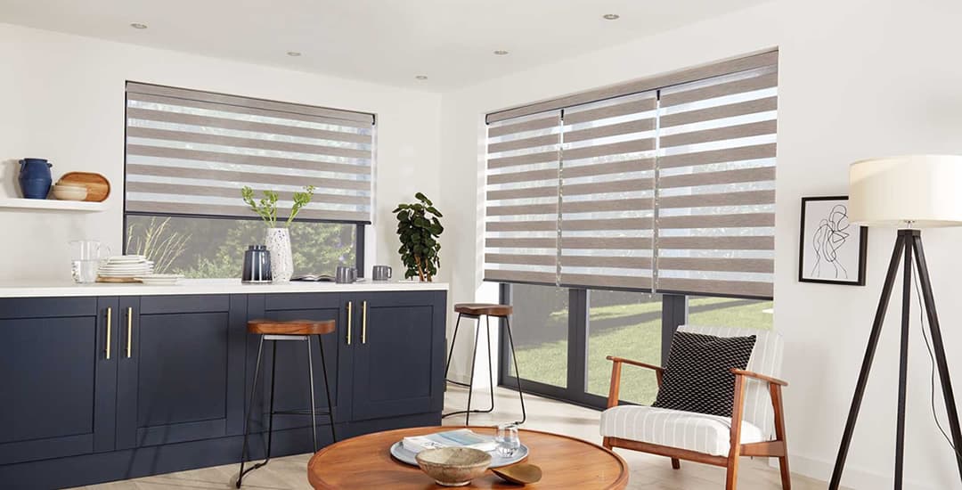 Taupe day and night blinds in contemporary blue and cream kitchen