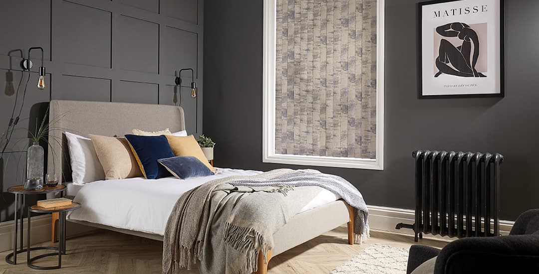 Brown patterned blackout vertical blinds in bedroom