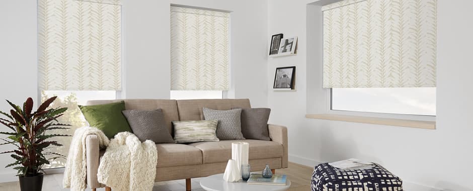 Luxury leaf patterned blackout roller blinds in white living room