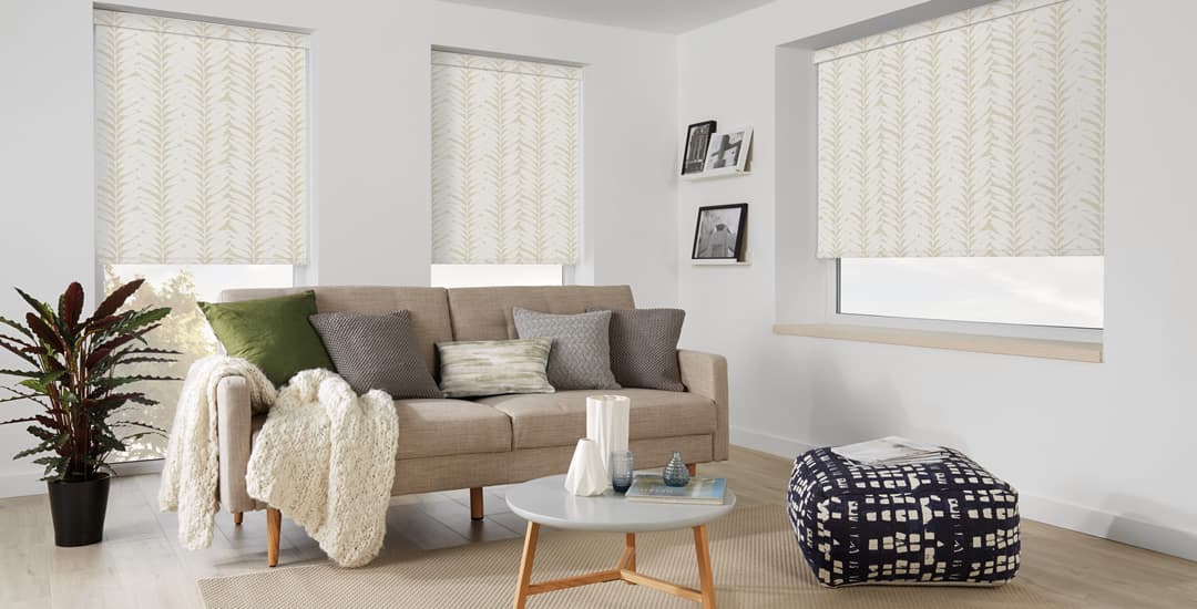 Luxury leaf patterned blackout roller blinds in white living room