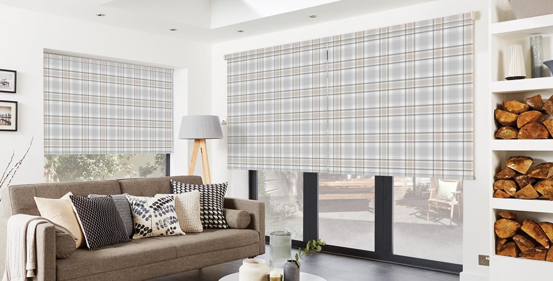 Tartan patterned patio door roller blinds in living room