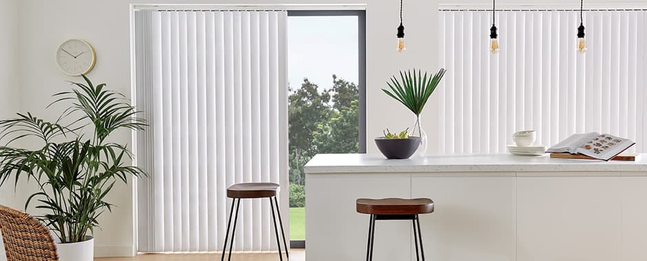 White patio door vertical blinds in contemporary kitchen