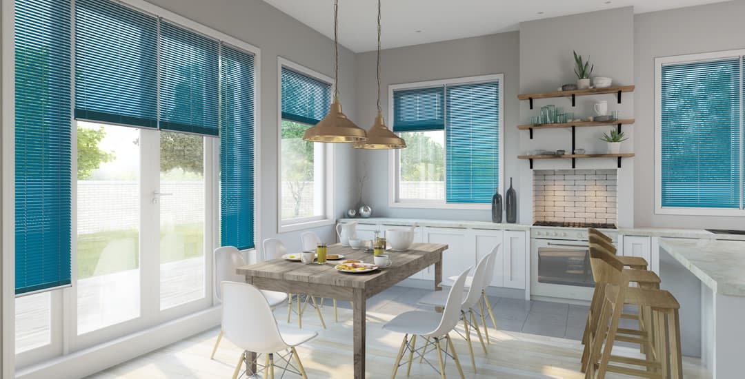 Blue venetian blinds in luxury kitchen diner