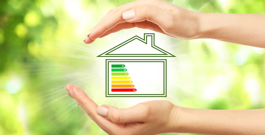 House with energy efficiency scale image on green background
