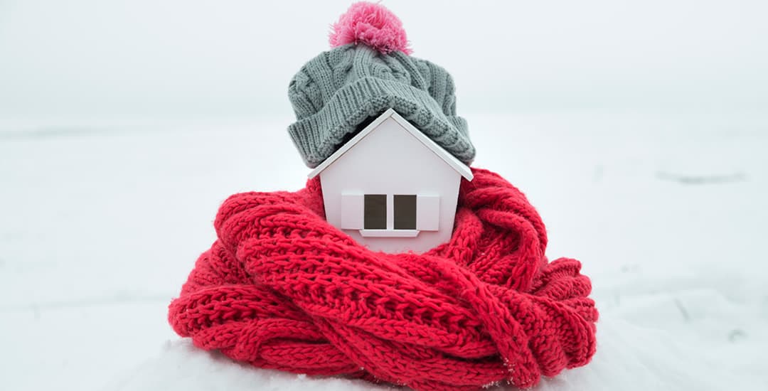 Insulated home wrapped in hat and scarf 