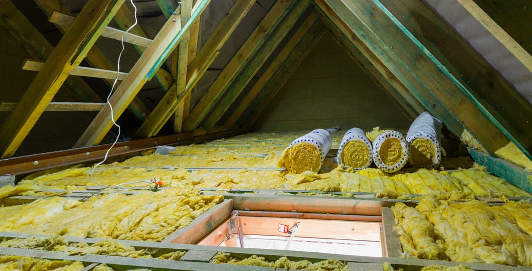 Loft insulation being installed