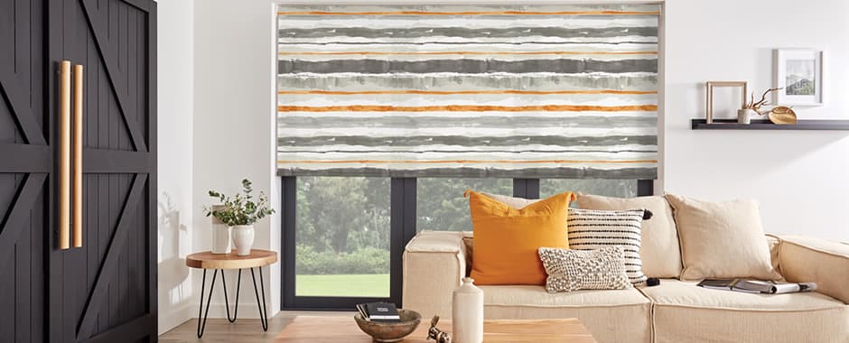 Modern on-trend colourful striped roller blind in living room