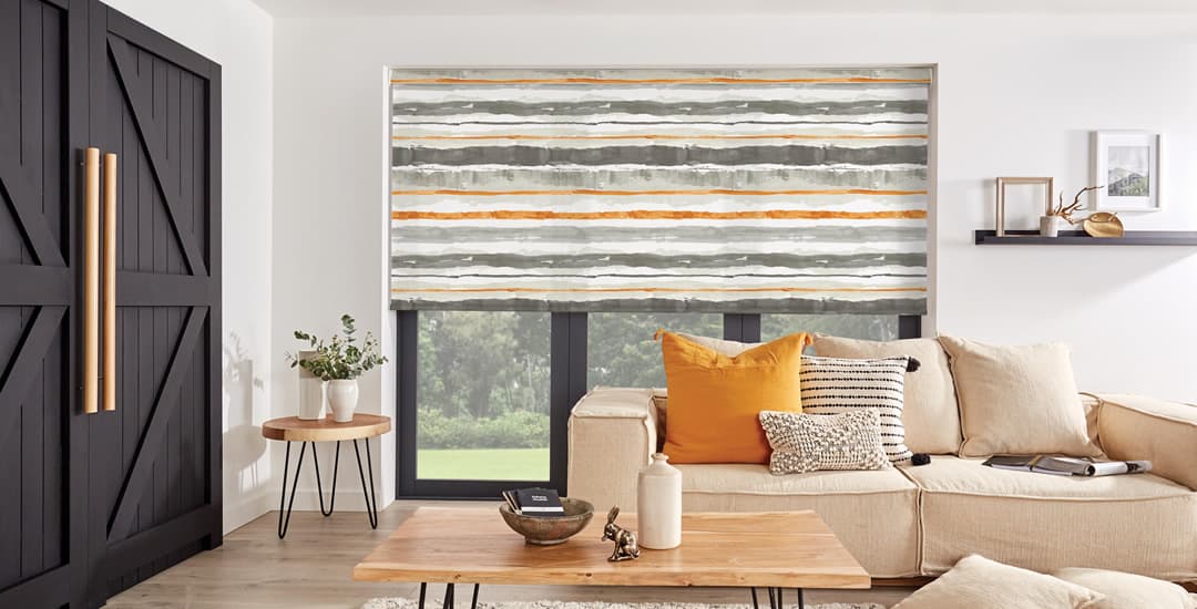 Modern on-trend colourful striped roller blind in living room