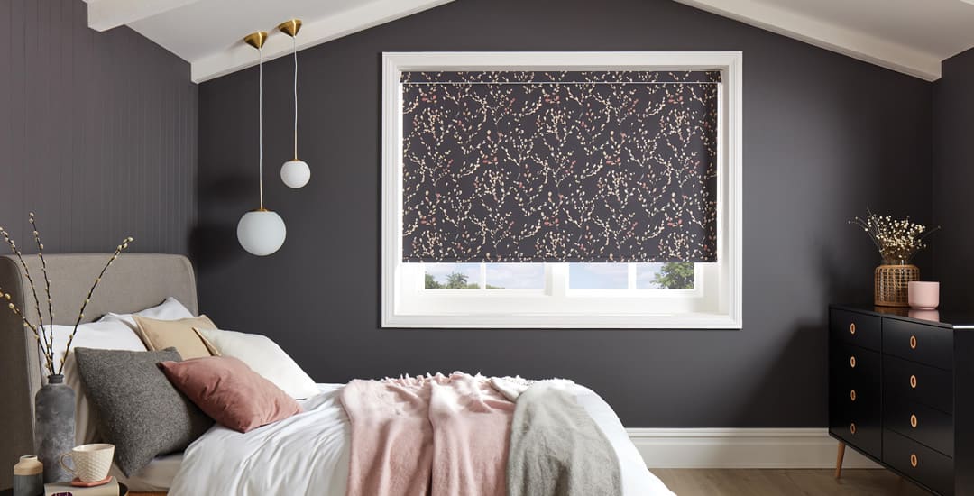 Dark willow patterned roller blinds in bedroom