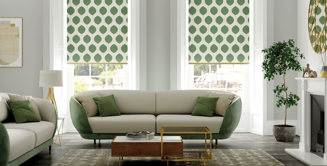 Green and cream themed living room with contemporary green patterned roller blinds