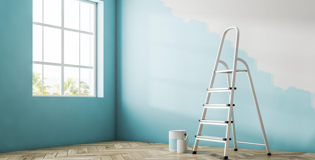 Half-finished blue painted wall