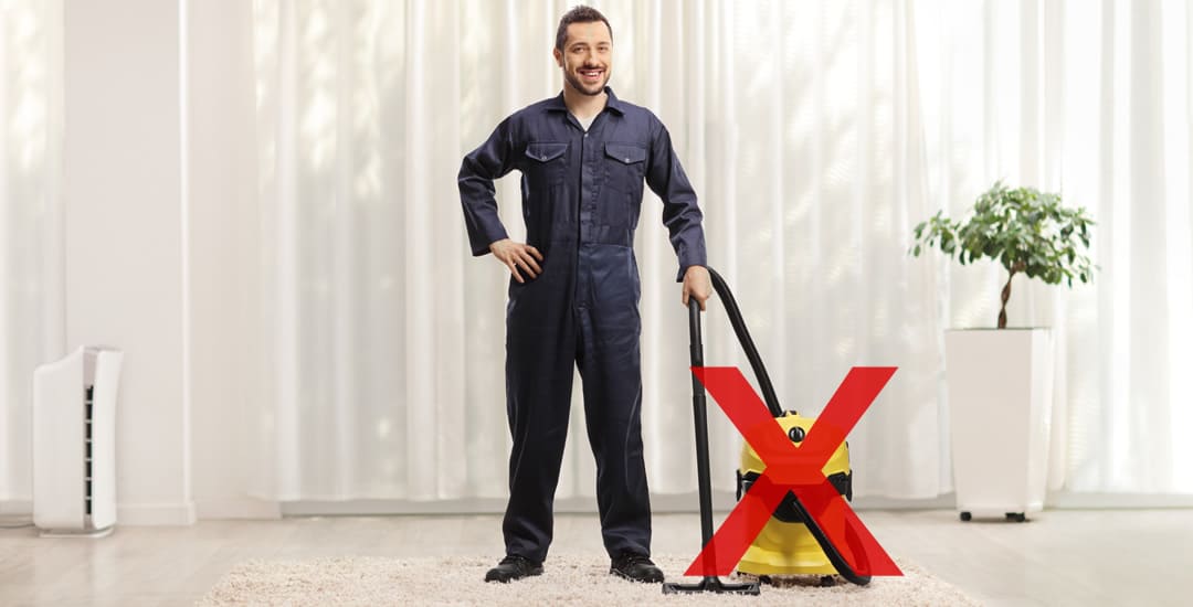 Man holding a carpet cleaner
