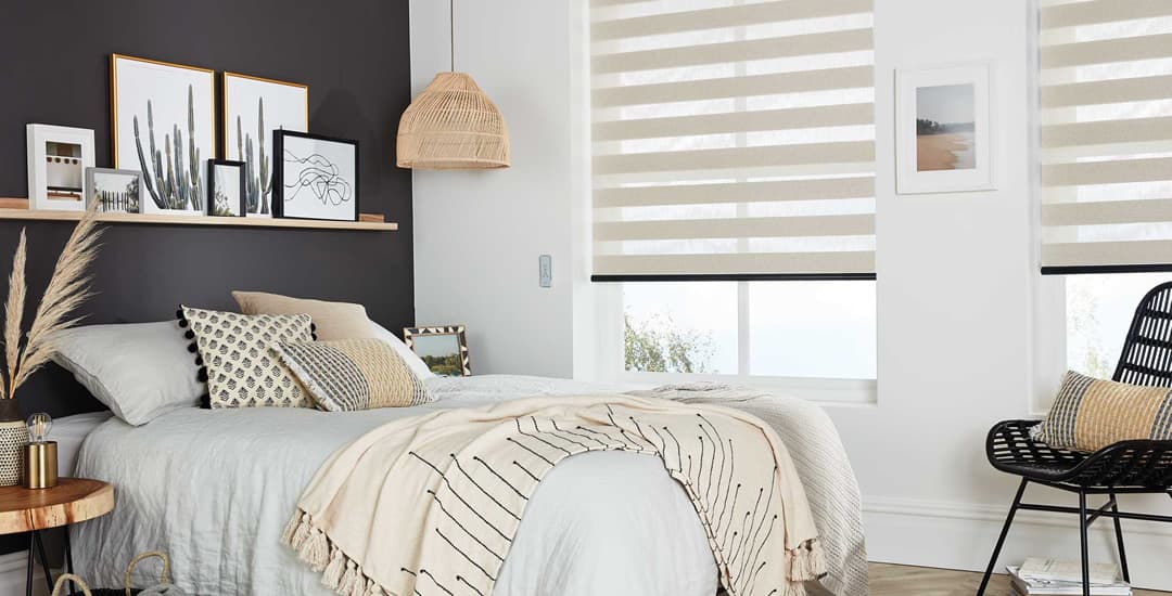 Beige day and night blinds in bedroom