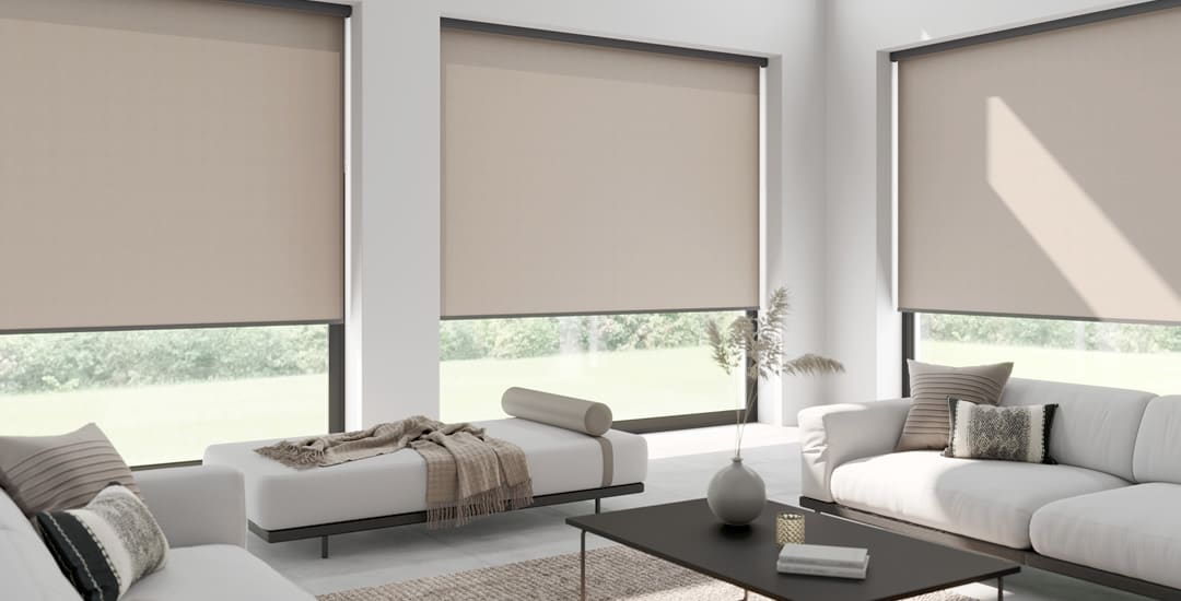 Beige thermal blackout roller blinds in contemporary living space 