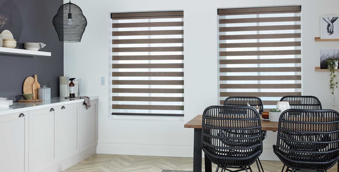 Brown day and night blinds in kitchen diner